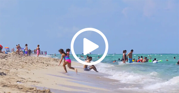 thumbnail of children playing on beach